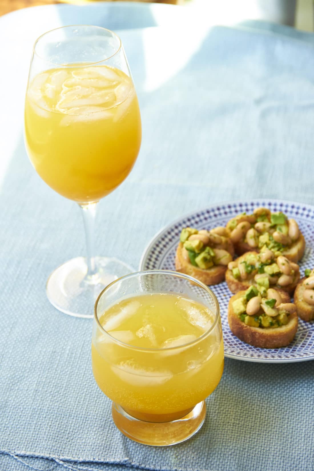 peach cocktail and mocktail plus cannellini bean and avocado crostini mia 1