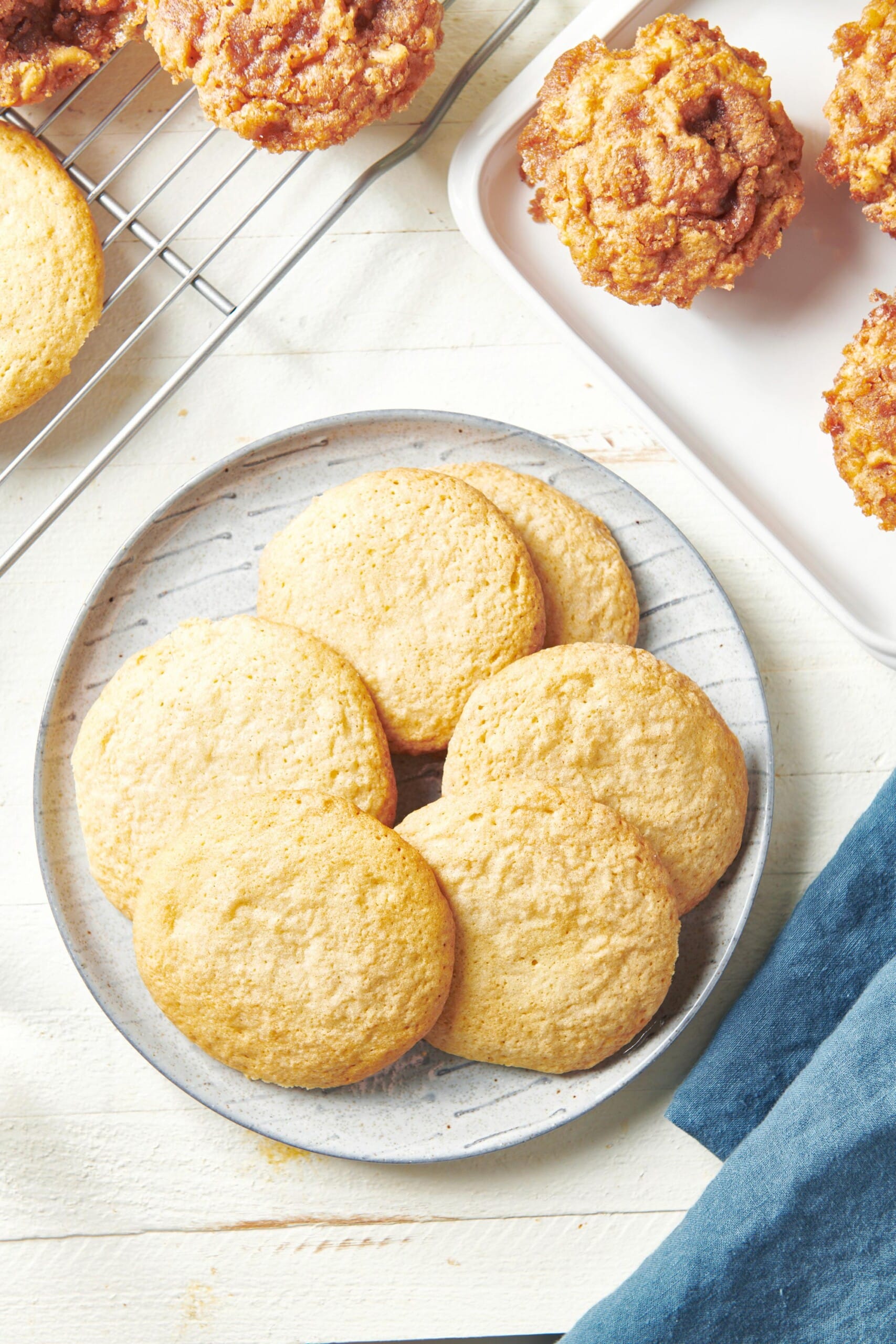 Pile of Soft Chewy Sugar Cookies on a plate.