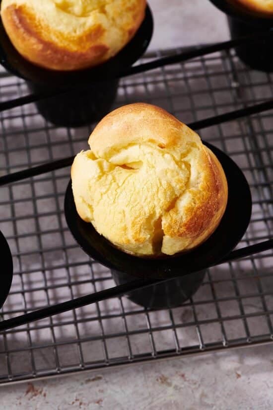 Popover in a popover tin in on a wire rack.