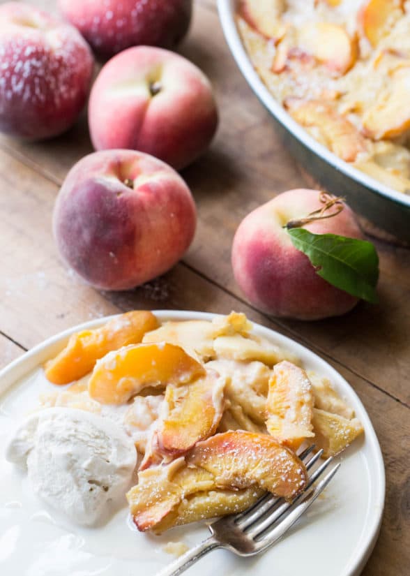 Plate with Peach Clafoutis and ice cream.