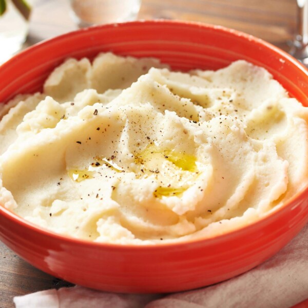 Butter melted onto a bowl of mashed potatoes.