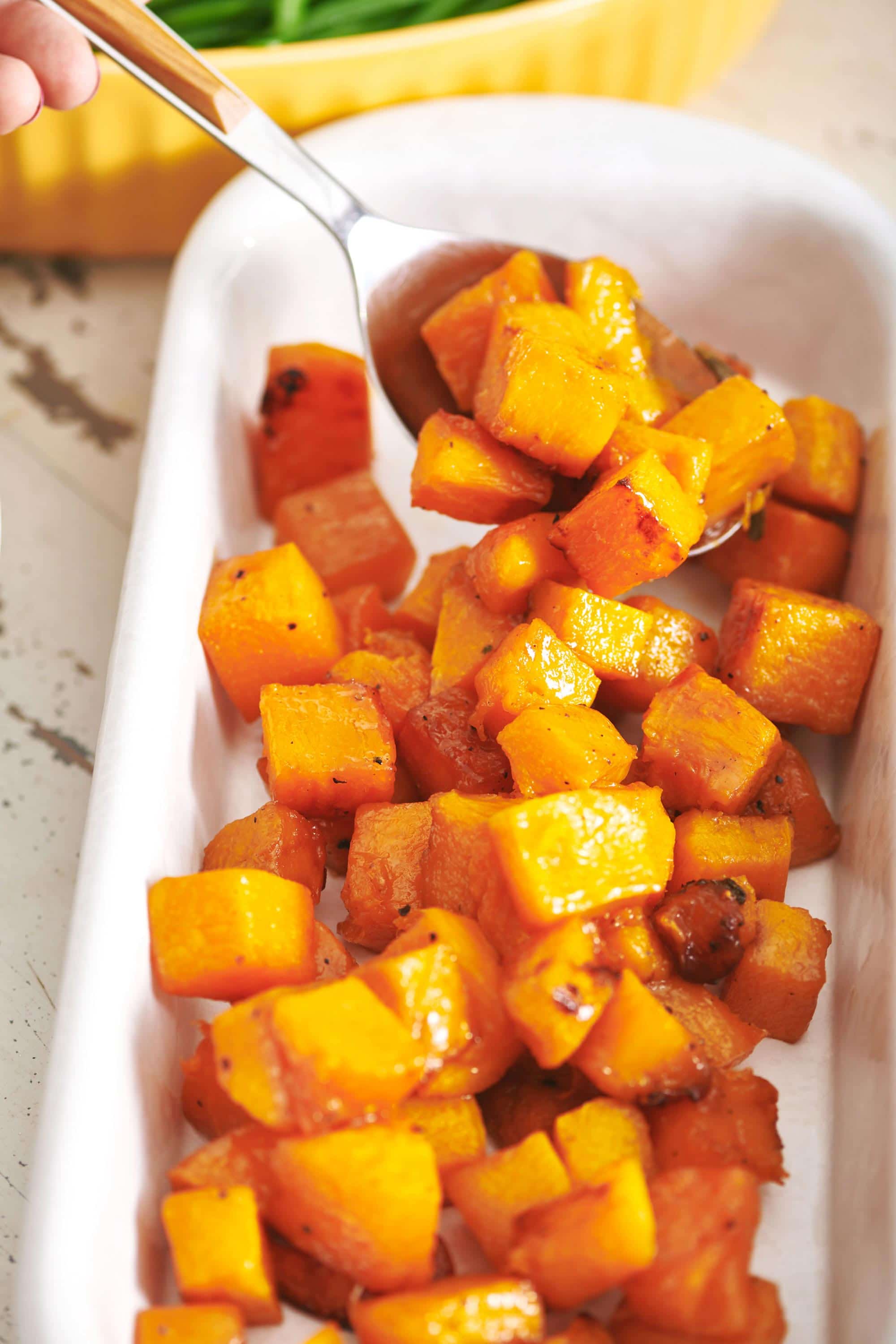 Spoon scooping Roasted Butternut Squash.