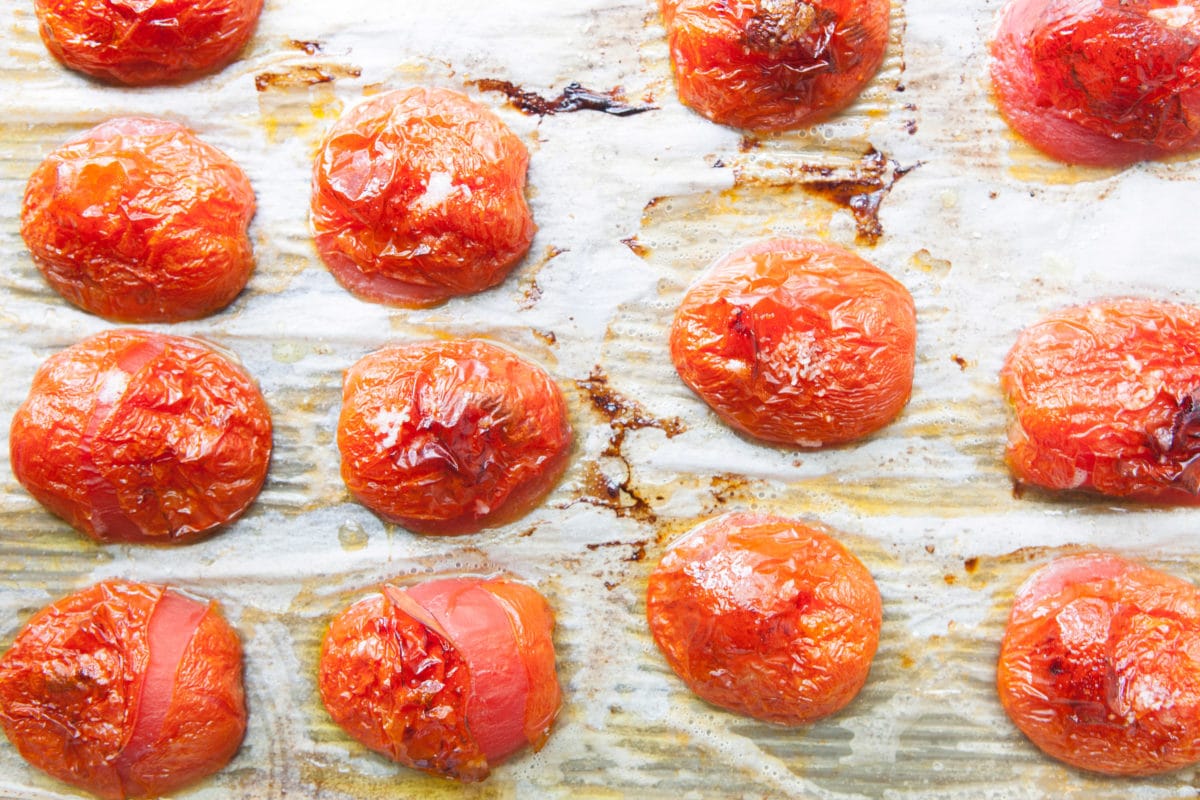 Lined baking sheet of Roasted Tomatoes.