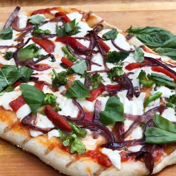 Grilled Pizza on cutting board.