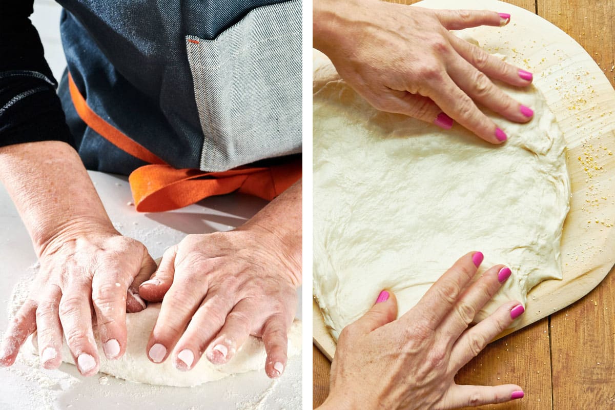 Woman rolling and shaping fresh pizza dough on table.