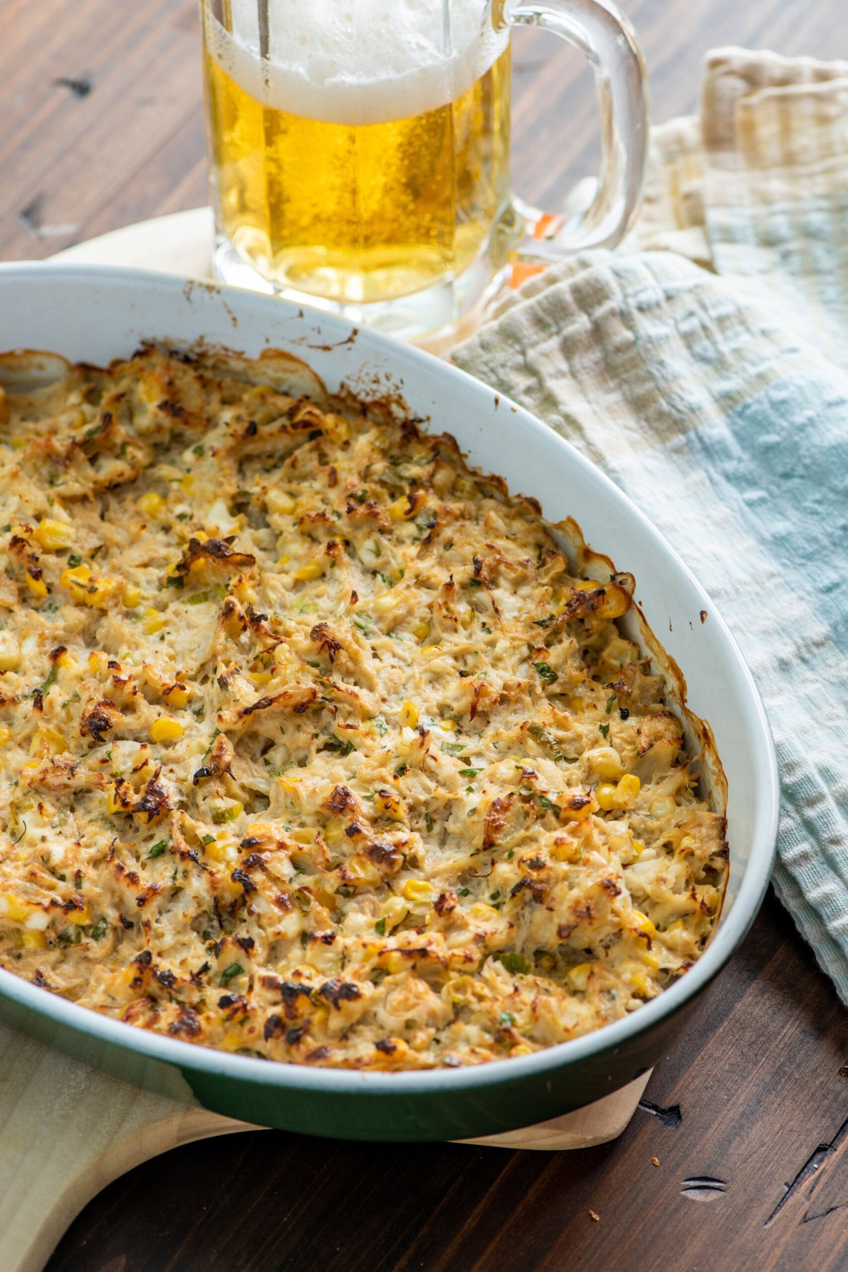 Hot Crab and Corn Dip in an oblong dish.