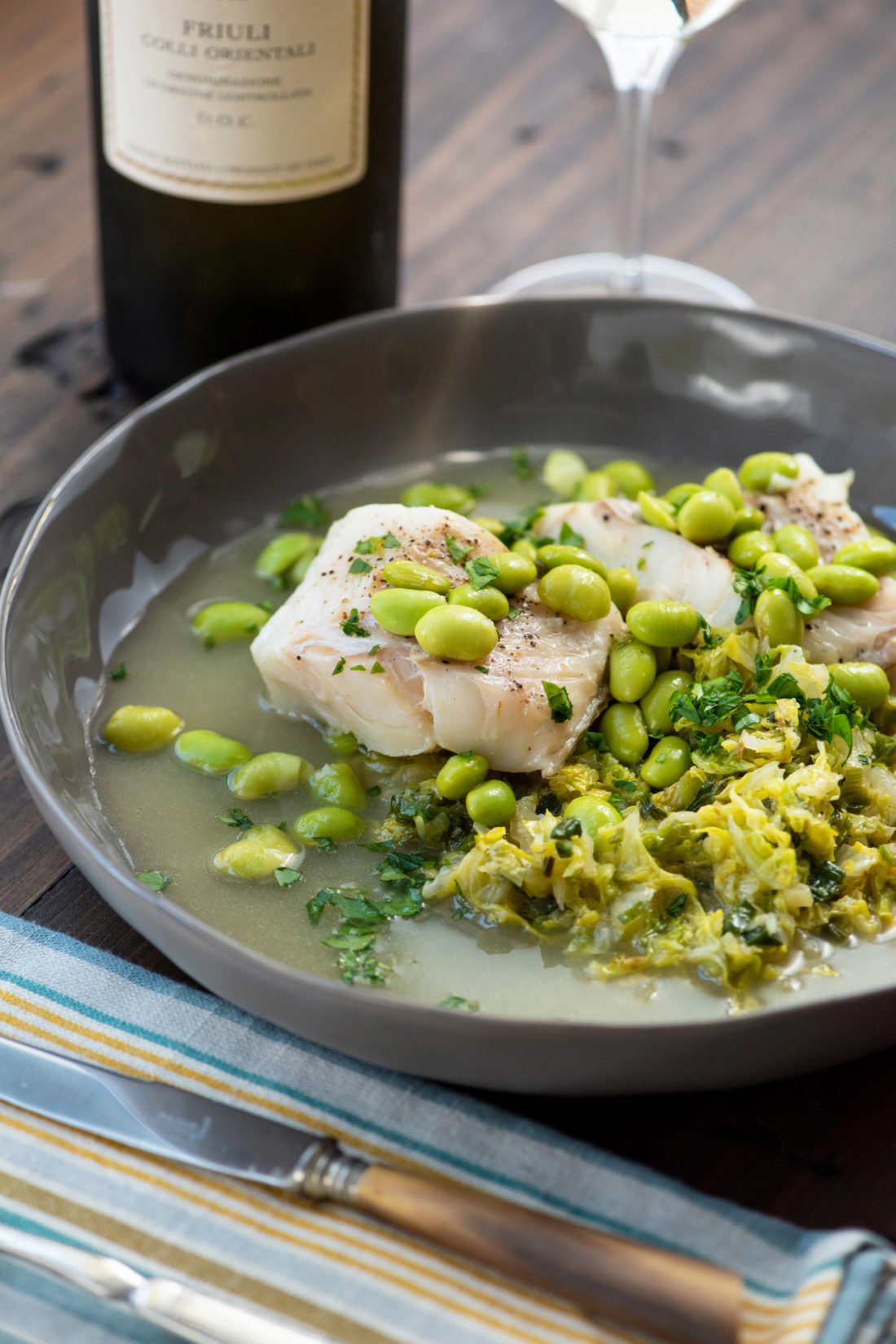 Cod, Cabbage and Edamame in a pan.