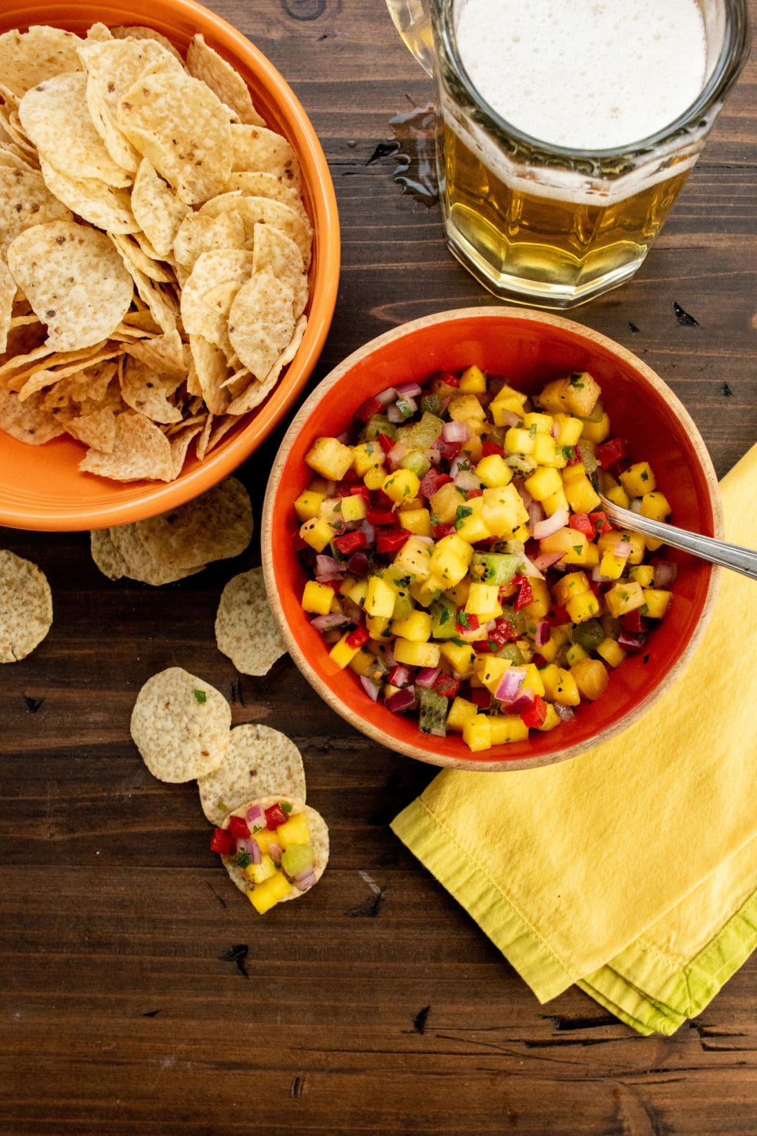 Bowls of Tropical Fruit Salsa and tortilla chips.