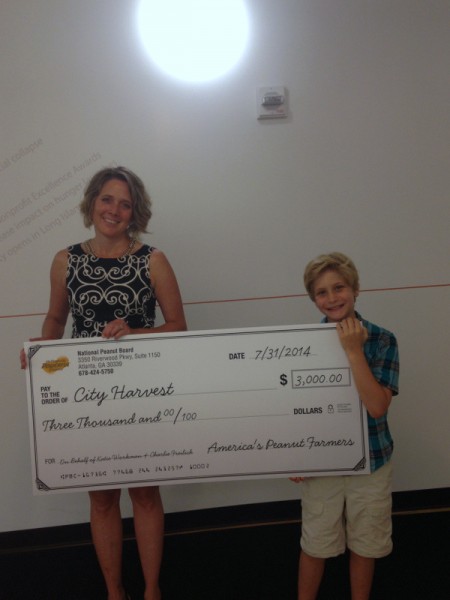 Charlie and Jen McClean of City Harvest accepting the check from the National Peanut Board