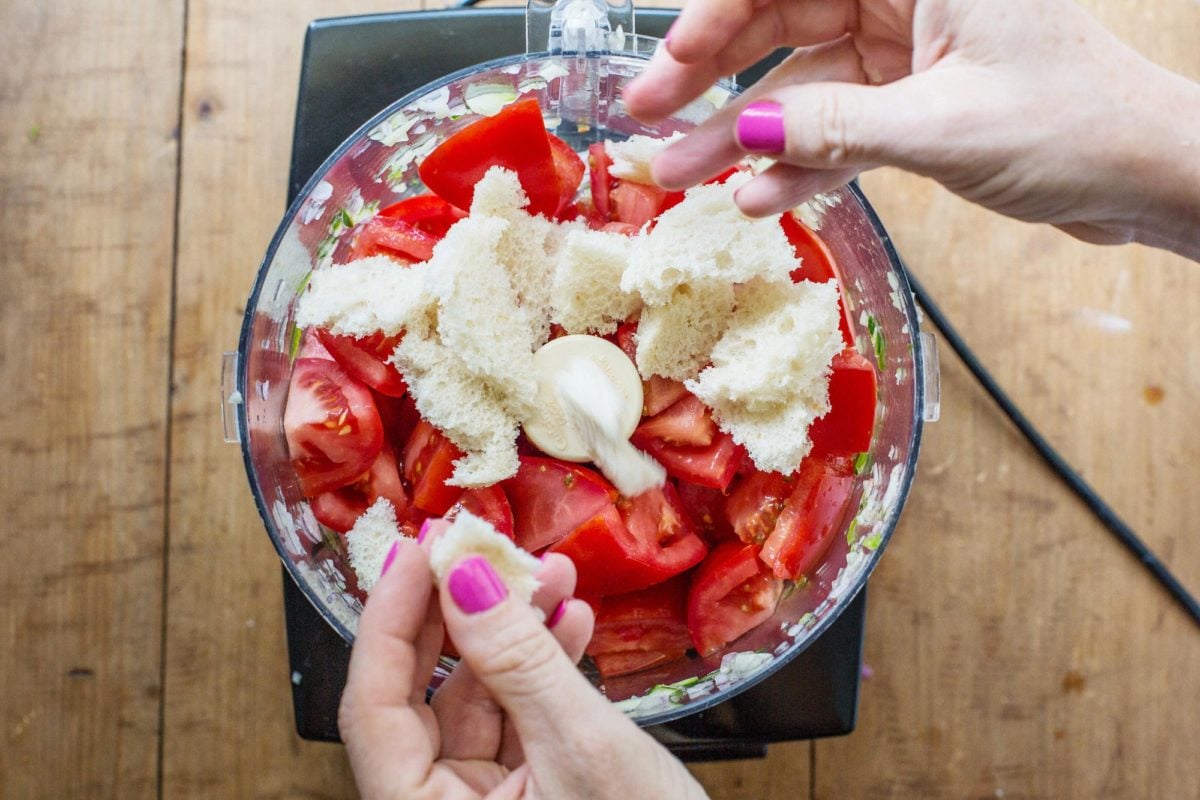 Chopping tomatoes and bread in the food processor