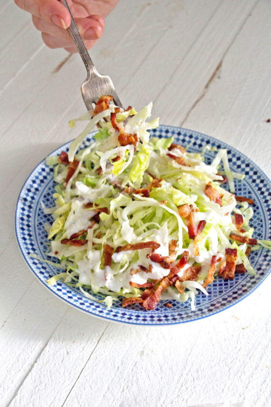 Bowl of salad with bacon and buttermilk dressing