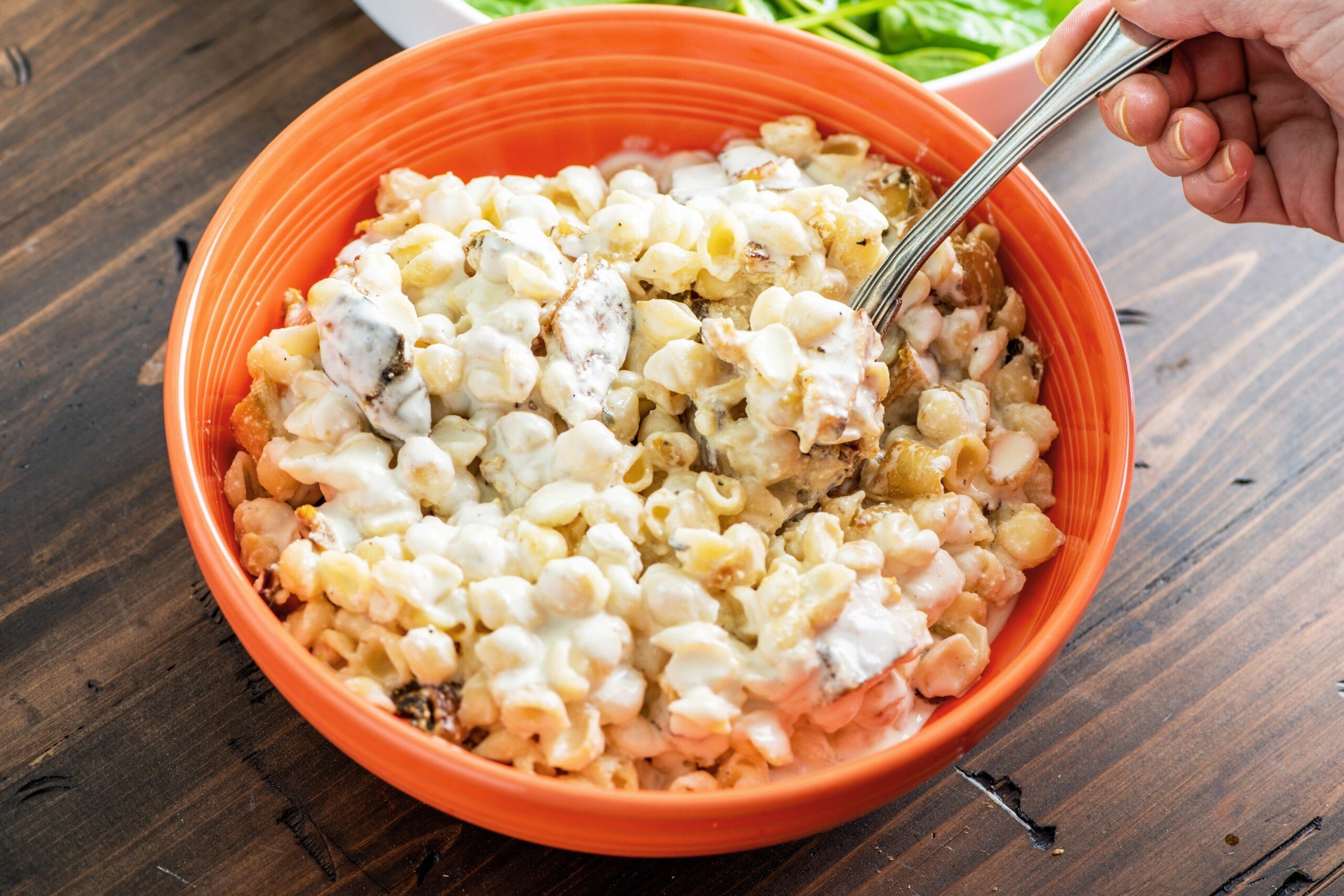 Orange bowl of Pasta Shells with Pumpkin in a Creamy, Cheesy Sauce.