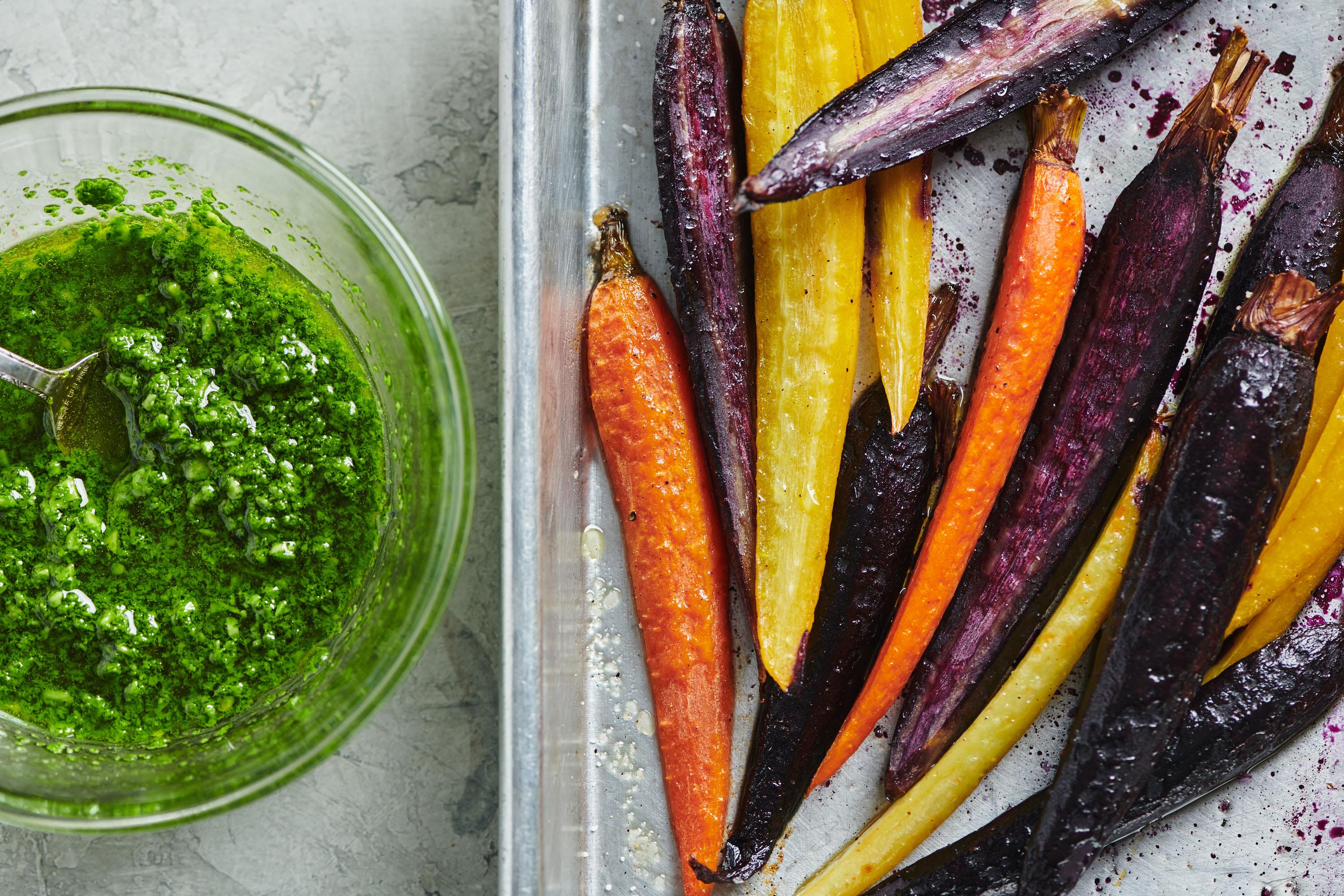 Colorful Roasted Carrots on a baking sheet.