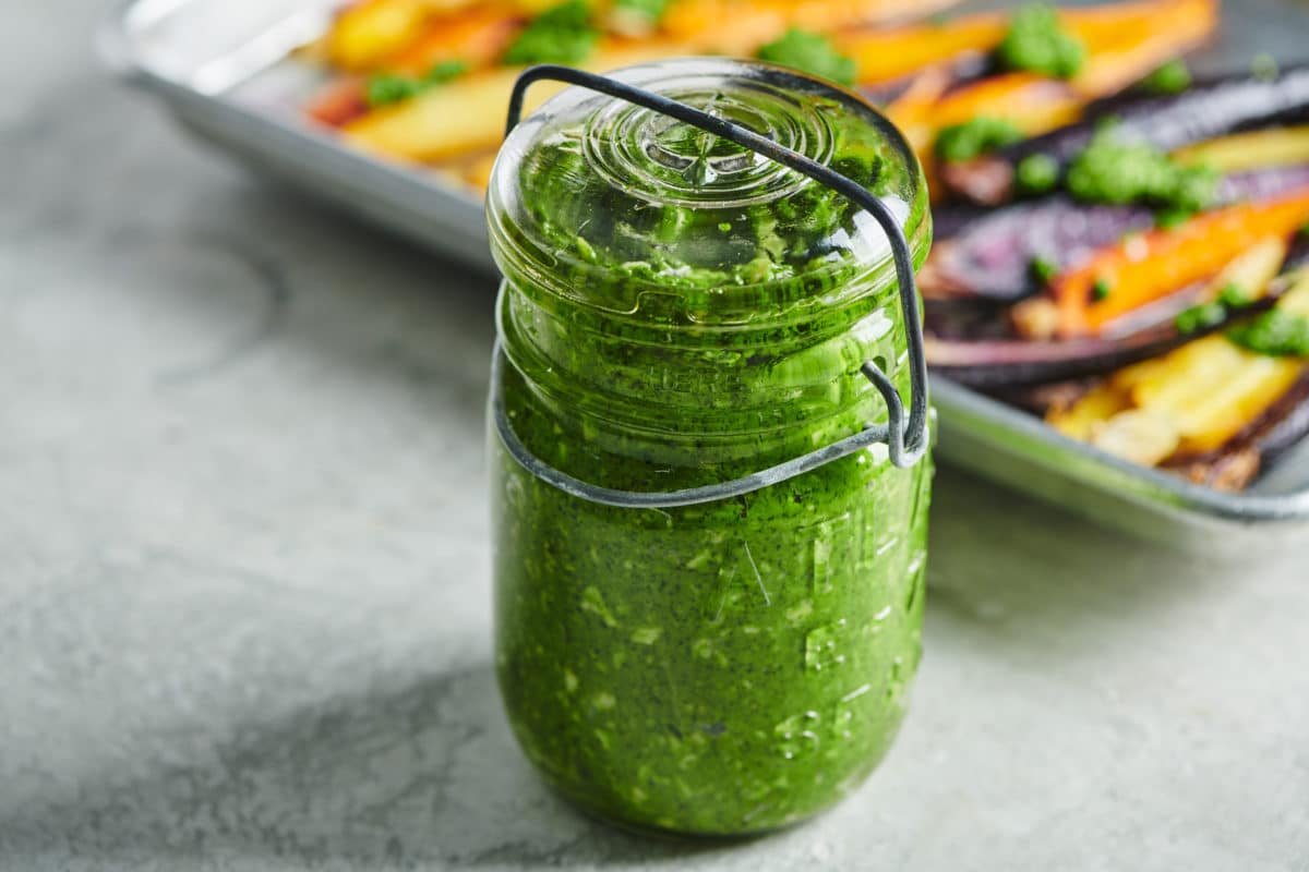 Spinach Parsley Pesto in glass jar.