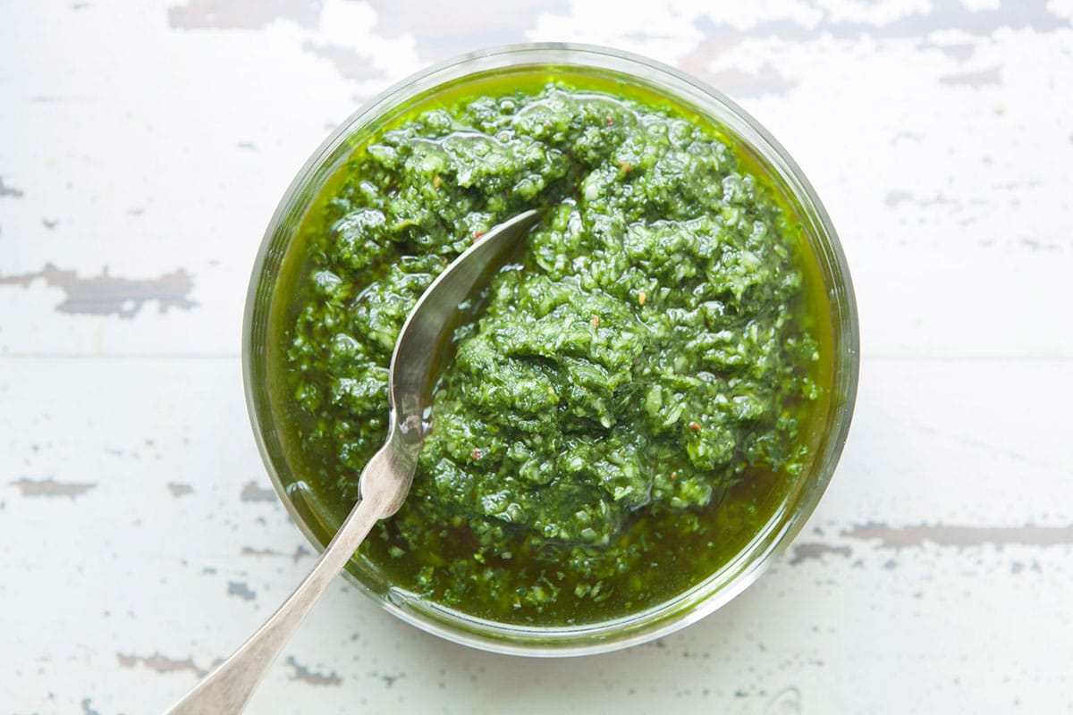 Ramp Chimichurri Sauce in bowl with spoon.