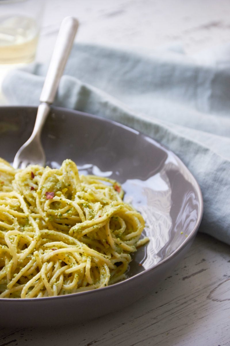 Grey plate of Pasta with Edamame, Mint and Basil Pesto.