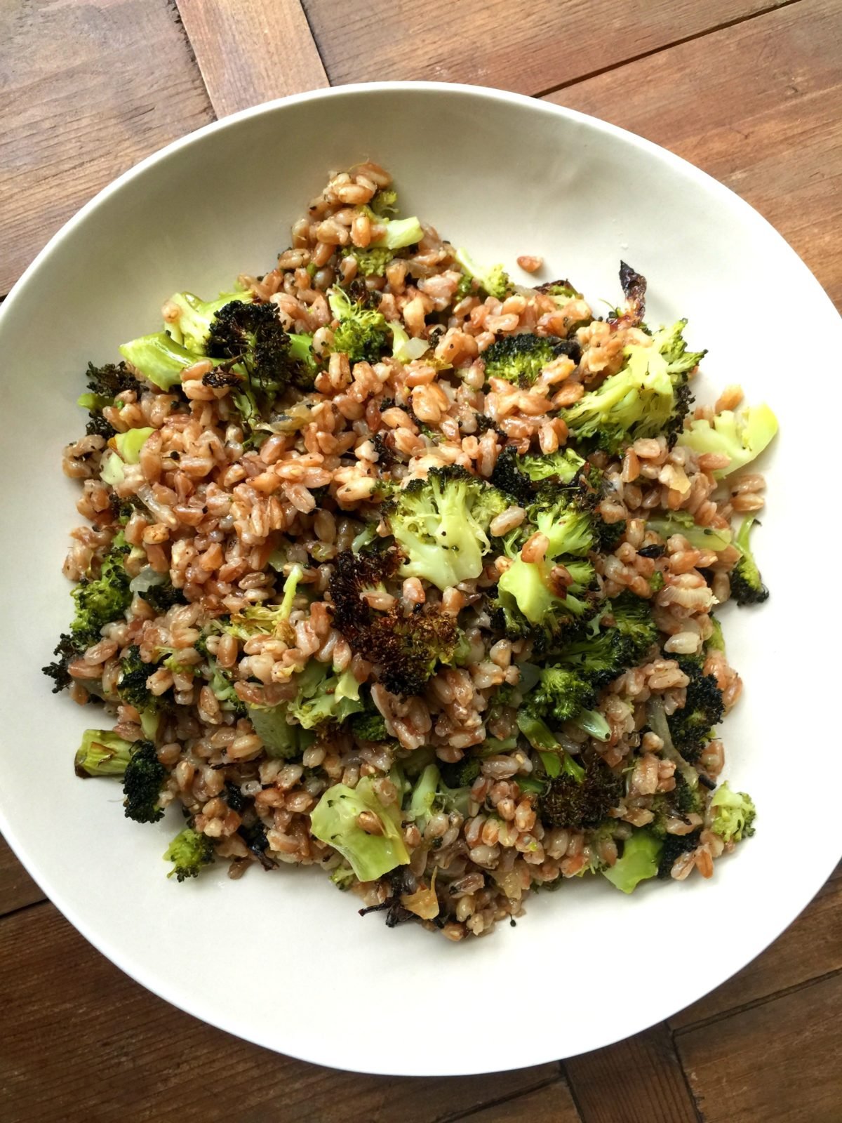 Farro with Grilled Broccoli and Sweet Onions on a plate.