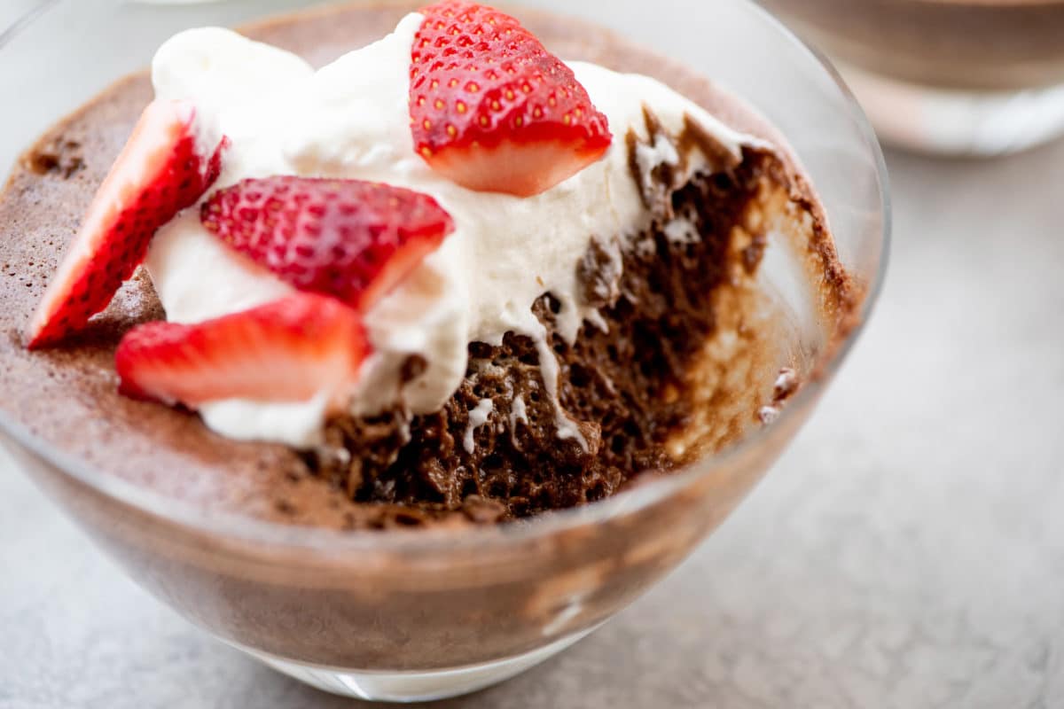 Dish of Chocolate Mousse with a scoop missing.