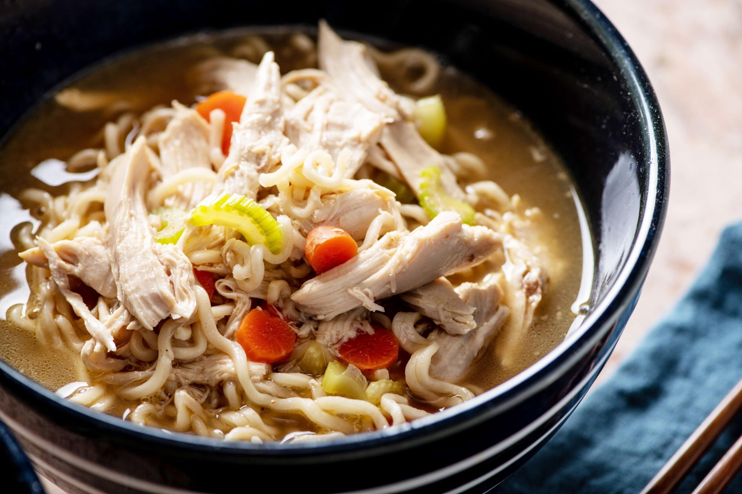 Chicken Ramen Noodle Soup piled high in a bowl.