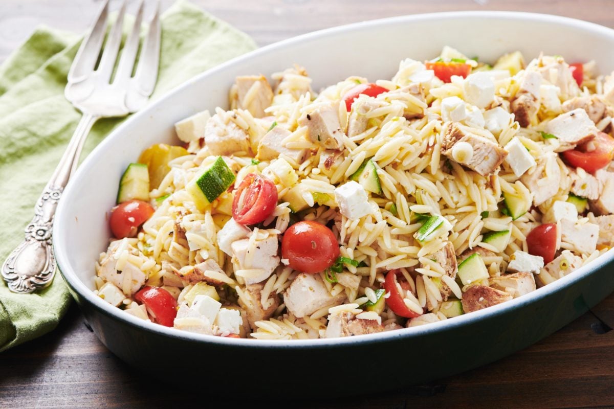 Black bowl of Greek Chicken Pasta Salad.