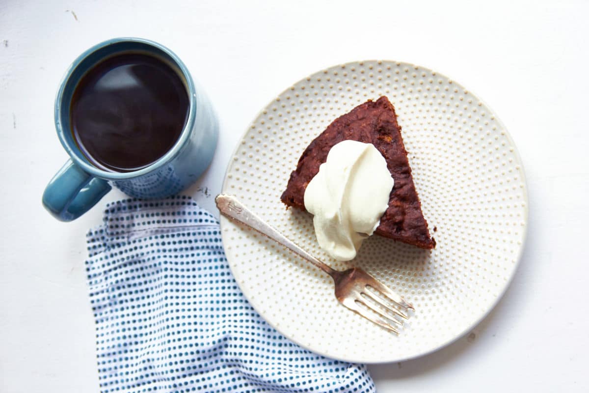 Fork and a slice of Chocolate Banana Cake on a plate.