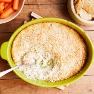Hot Jalapeno Popper Dip in a yellow baking dish.