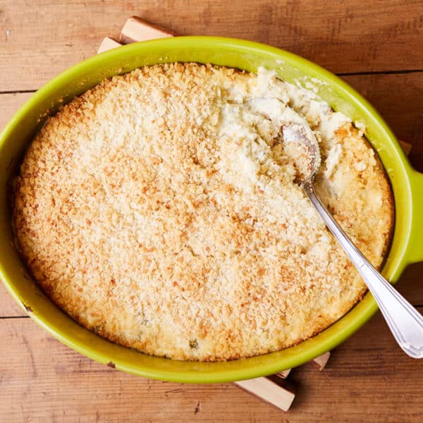 Hot Jalapeno Popper Dip in a yellow baking dish.