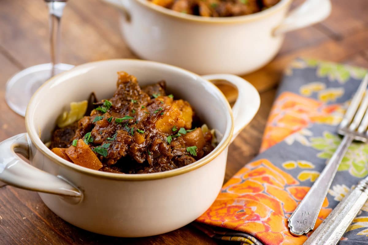 White, handled bowl of Barbecue Beer Beef Stew.