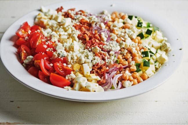 Bleu cheese sprinkled over a Cobb Salad.