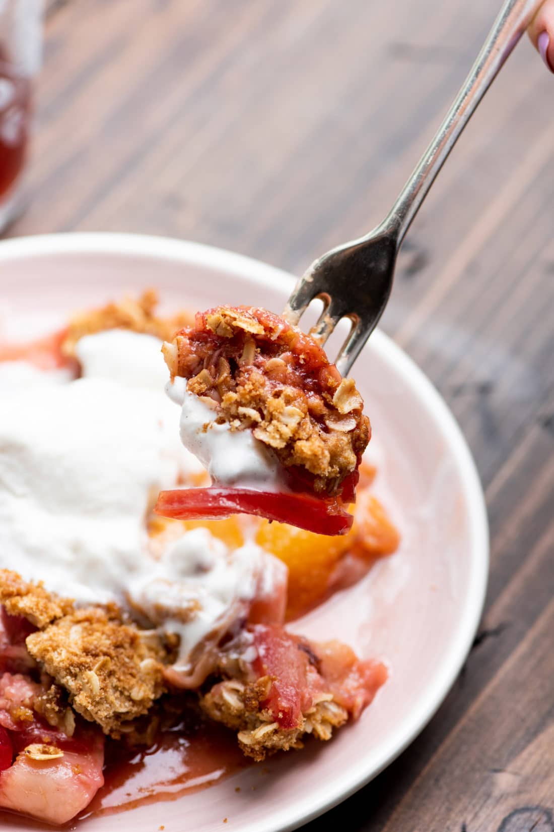Fork with Plum and Nectarine Crisp and ice cream.