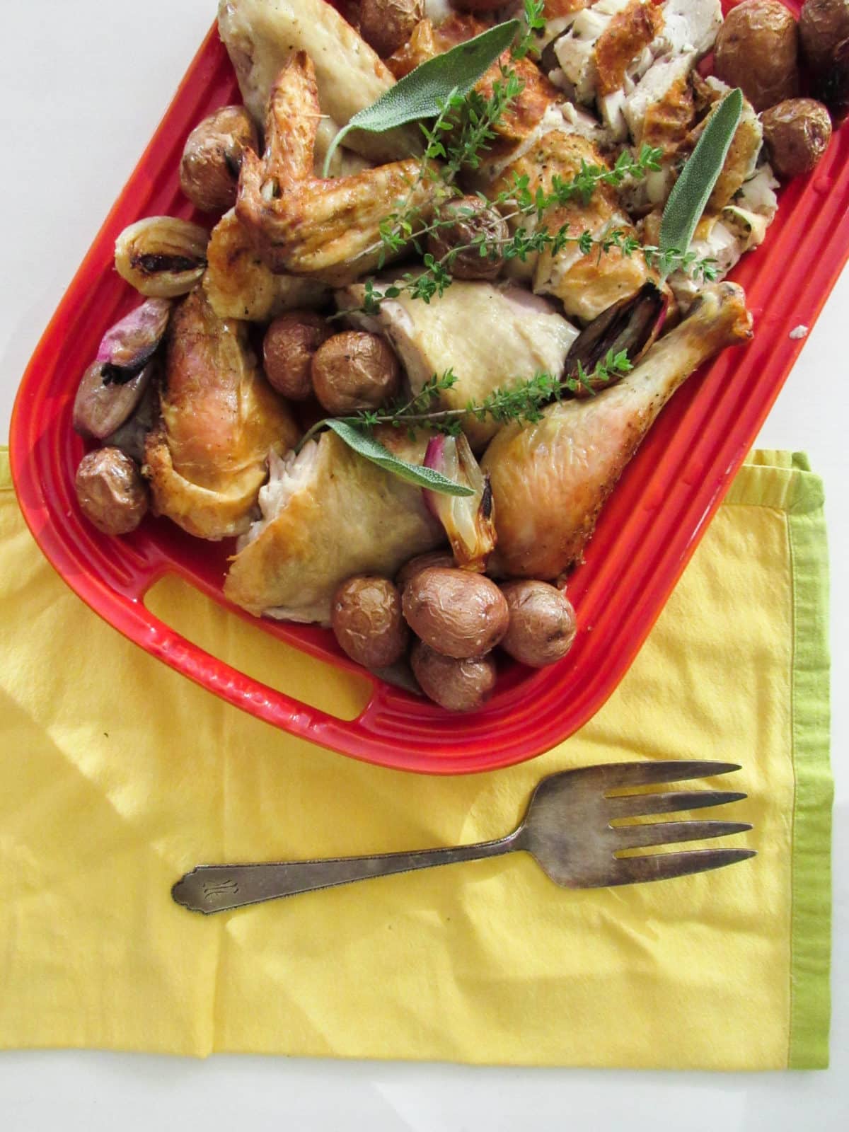 Garlicky Roast Chicken with Shallots and Potatoes / Lucy Beni / Katie Workman / themom100.com