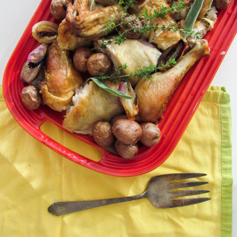 Garlicky Roast Chicken with Shallots and Potatoes / Lucy Beni / Katie Workman / themom100.com