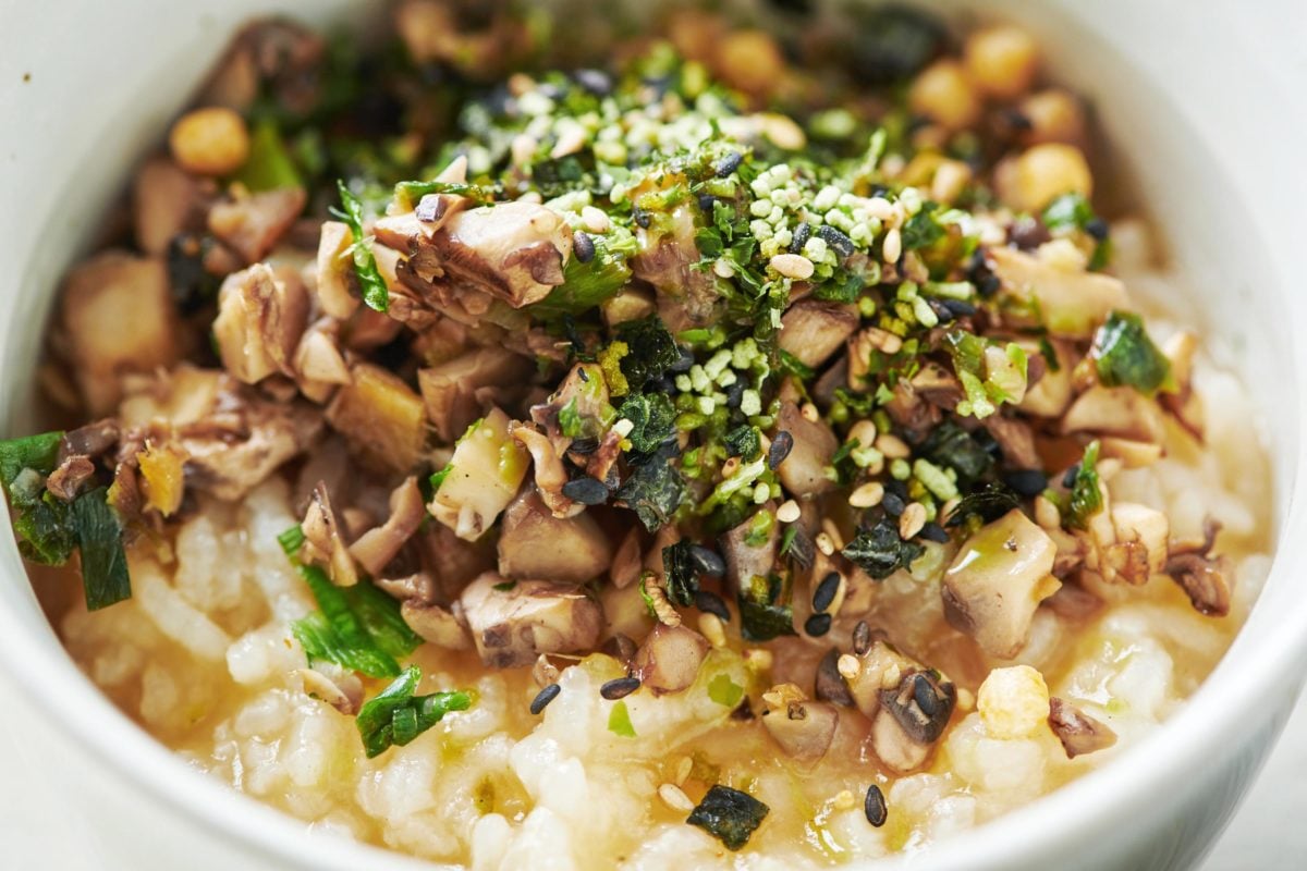 Congee (Chinese Rice Porridge) topped with a mushroom mixture.