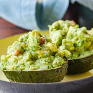 Guacamole piled high in avocado halves.