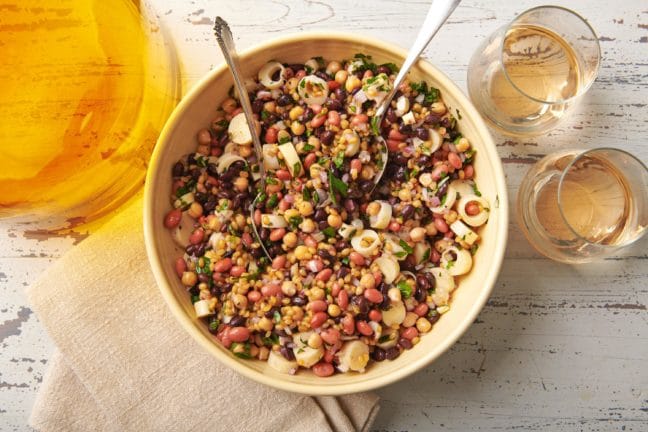 Modern Three Bean Salad with spoons in a bowl.