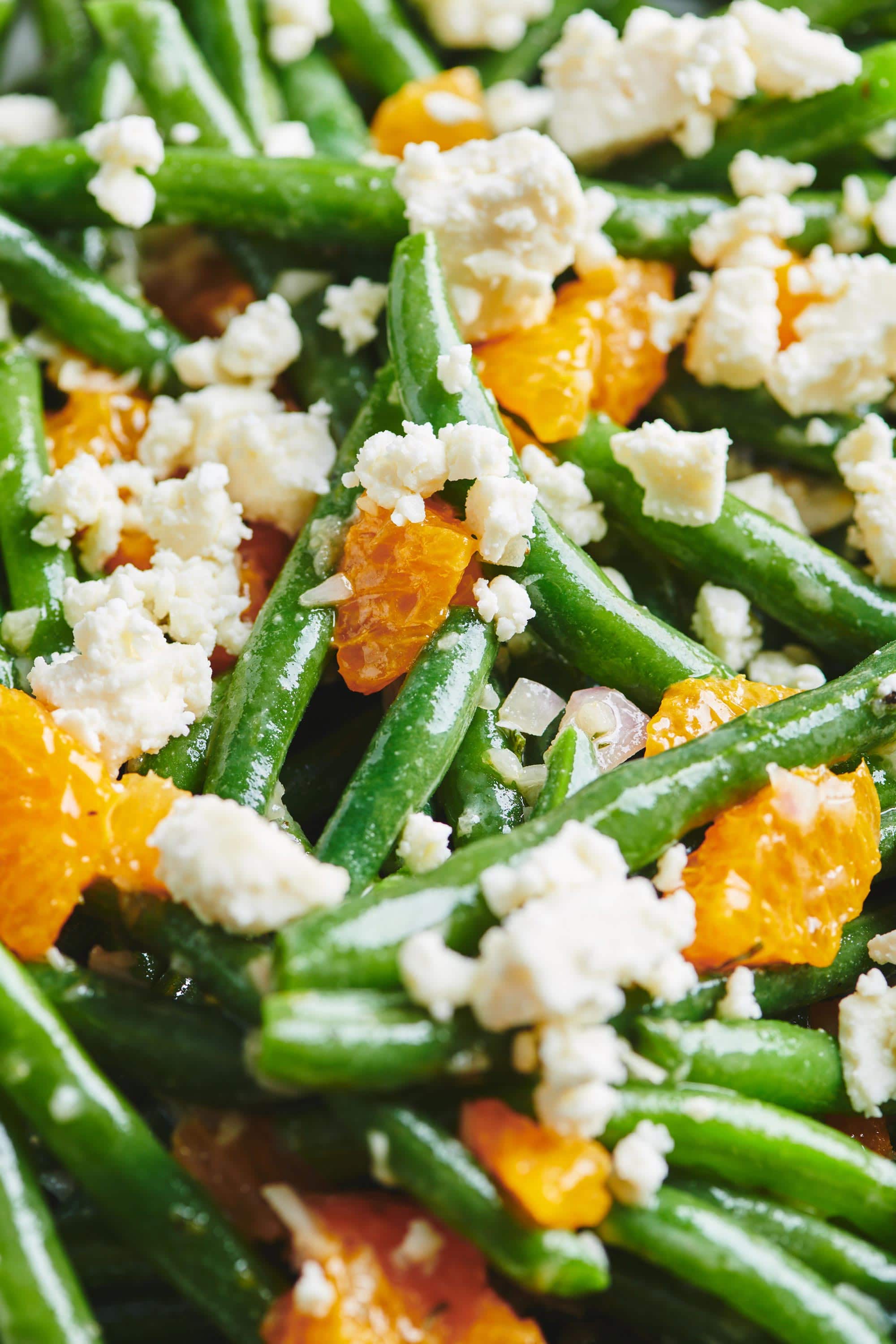 Green Beans, feta, and clementine oranges mixed together with dressing.