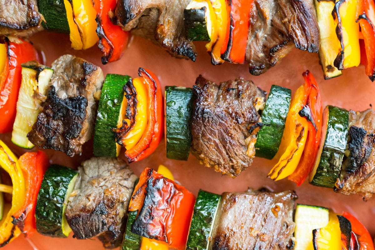 Beef Teriyaki, peppers, and zucchini on skewers.