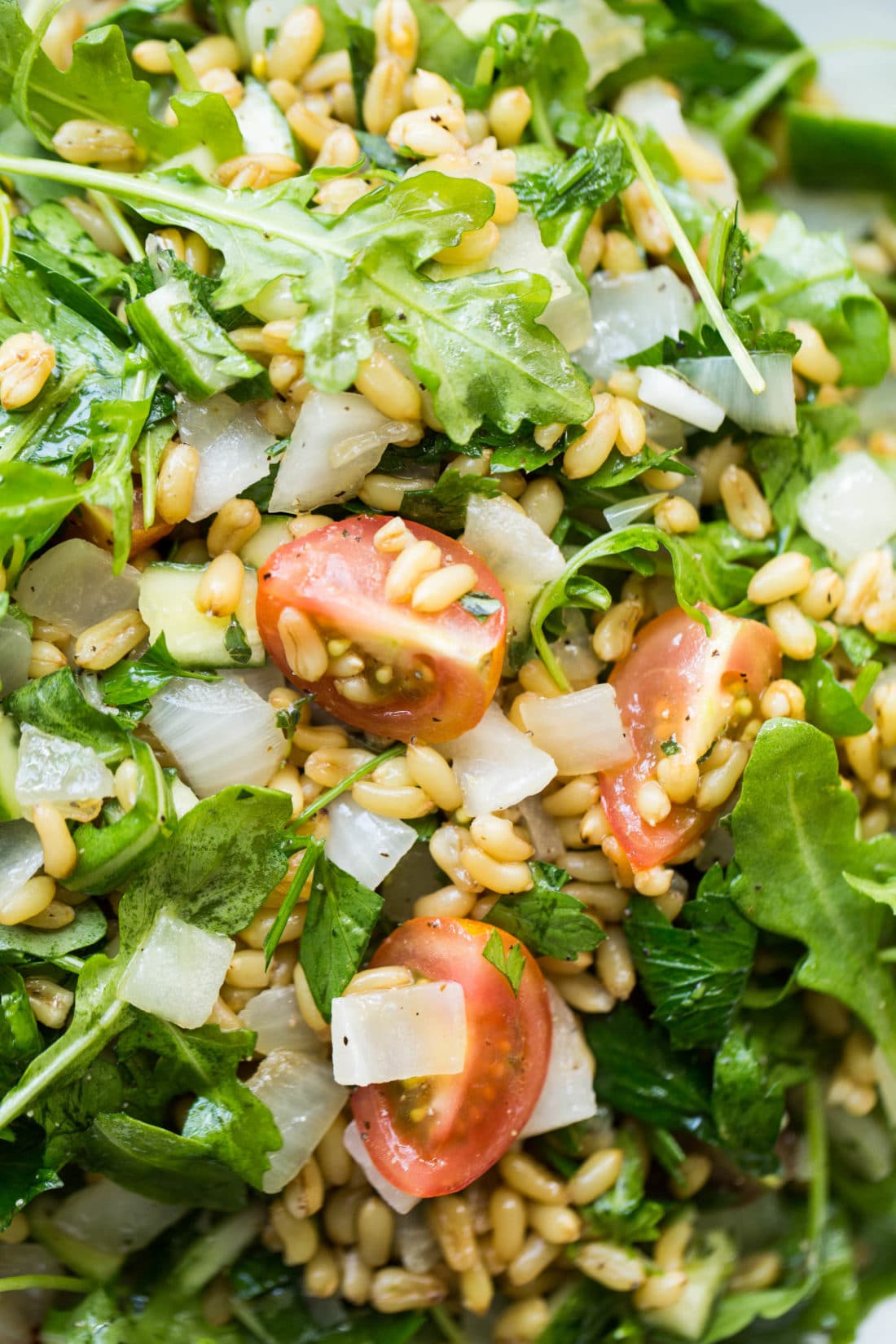 Kamut Tabbouleh Salad with onions and tomatoes.