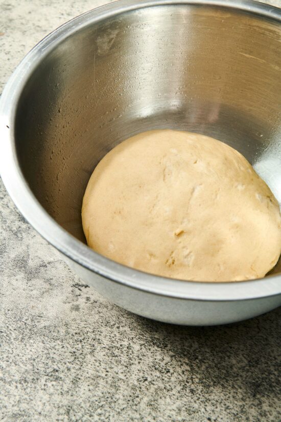 Metal bowl of Pizza Dough.
