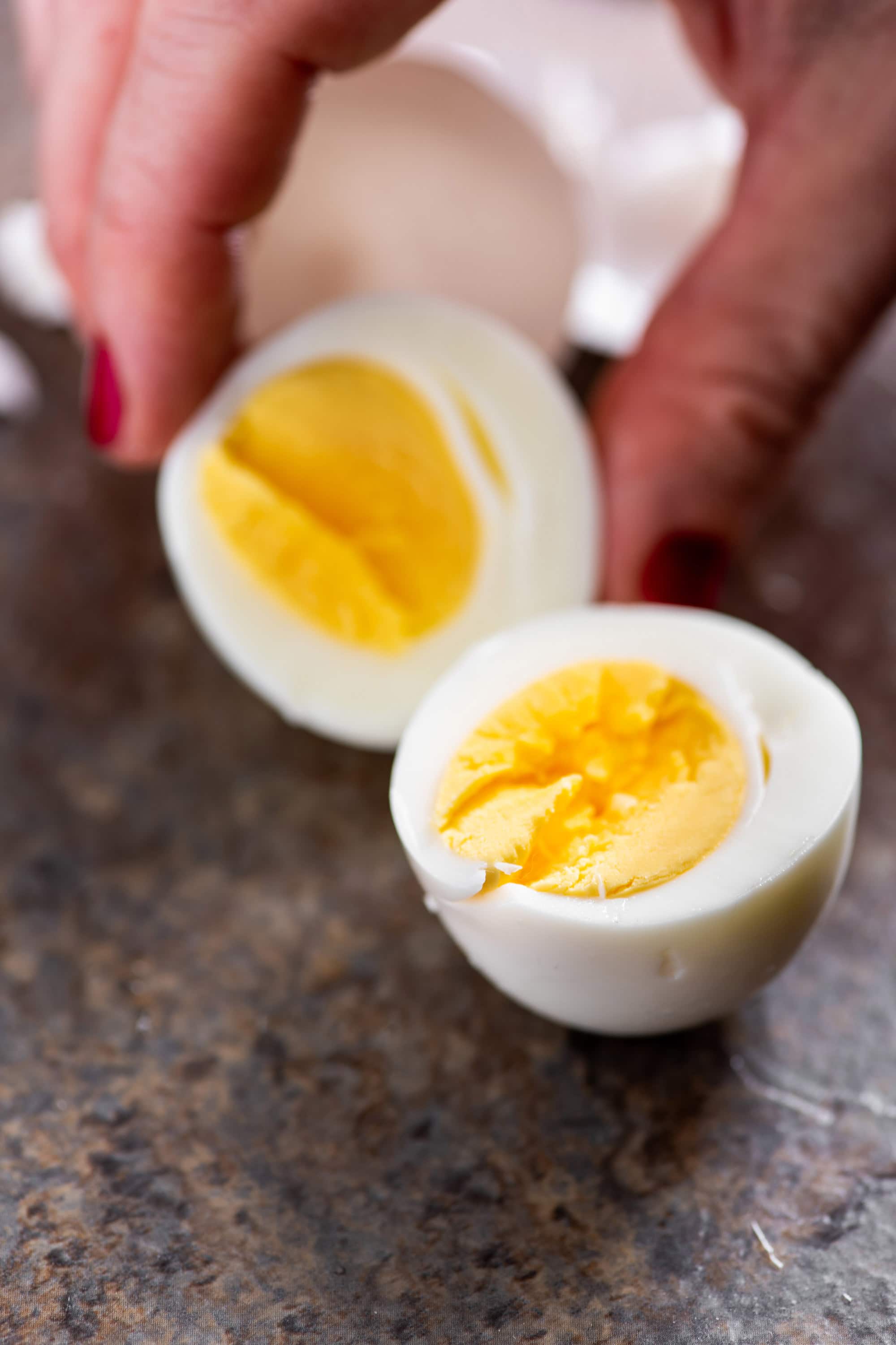 Perfectly cooked hard boiled egg cut in half.