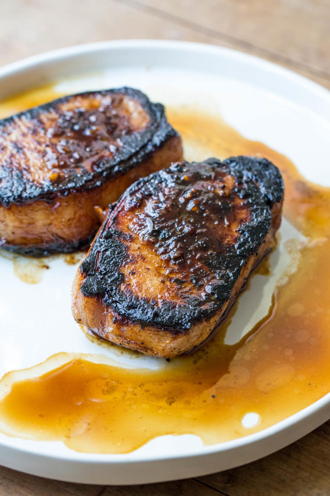 Korean Pork Chops on a white plate.