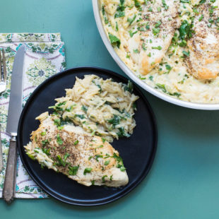 Cheesy Chicken and Orzo in a skillet and on a plate.