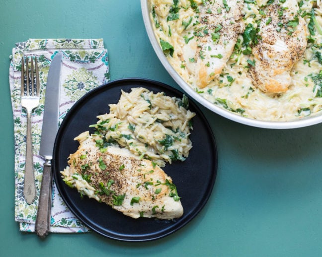 Cheesy Chicken and Orzo in a skillet and on a plate.