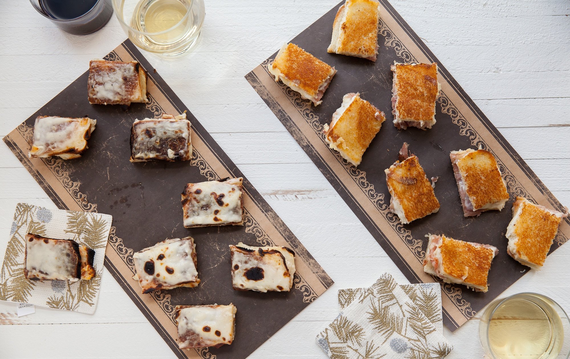 Two trays of Mini Croque Monsieurs with Prosciutto.