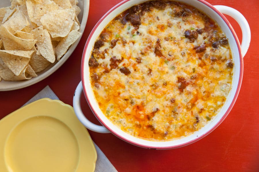 Queso Fundido with Chorizo in a handled bowl.