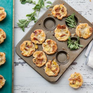 Muffin tin of Bacon, Leek, Mushroom and Cheese Mini Quiches.