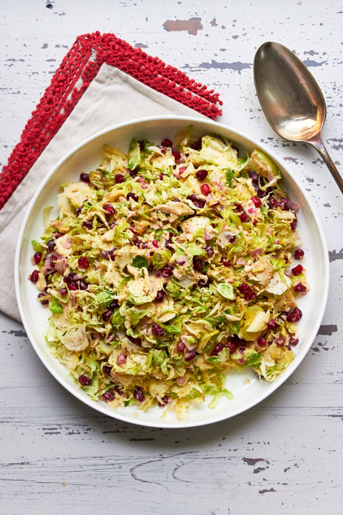 Brussels Sprouts, Apple, and Pomegranate Slaw Salad