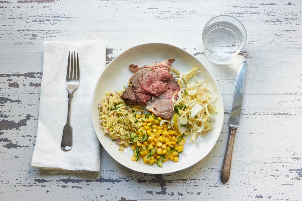 Herbed Roasted Leg of Lamb with Mustard Crust, Greek Orzo, Creamy Endive Salad and Sauteed Corn with Zucchini and Browned Butter / Mia / Katie Workman / themom100.com