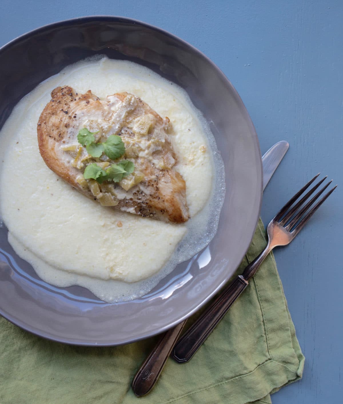 Grits with Chicken and Tomatillo Green Chili and Sour Cream Pan Sauce / Lucy Beni / Katie Workman / themom100.com