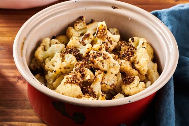 Sautéed Cauliflower with Mustard Seeds in a red pot.